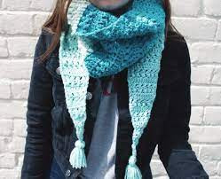 Crochet convertible mod scarf measures 80′′ long without tassels.